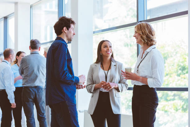 istock Business people in convention center during coffee break 2193011782