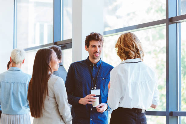 Business people in convention center during coffee break