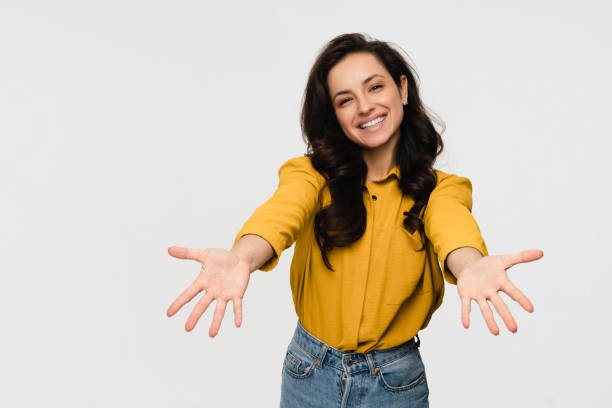 istock Friendly woman stretching hands hugging someone extending arms for cuddle embracing someone isolated 2193012888