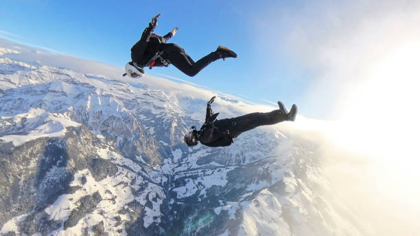 istock Freefall jumpers face each other mid-air 2193013802