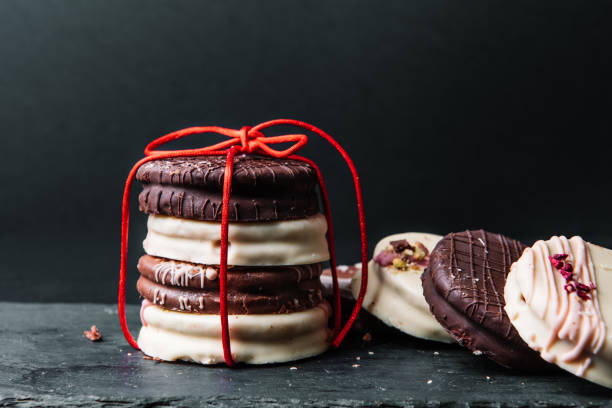istock Ischler cookies coated with brown and white chocolate glaze 2193014506