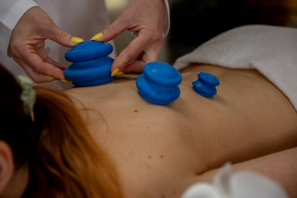 istock Therapeutic Cupping Therapy Utilizing Unique Blue Cups for Enhanced Healing and Balance 2193015269
