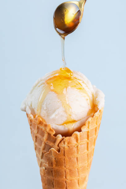 istock Summer coconut ice cream with minimalist blue background 2193017061