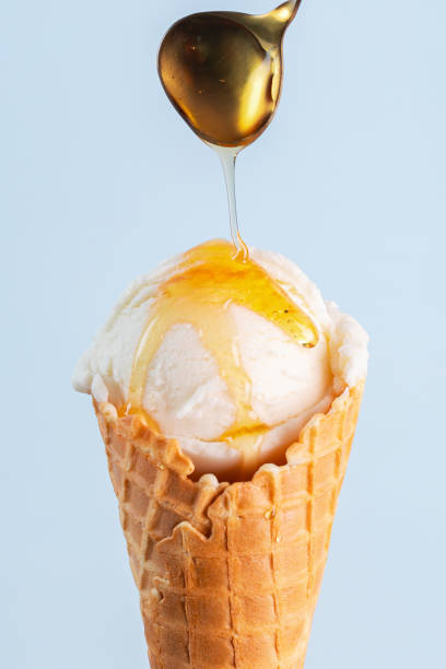 istock Summer coconut ice cream with minimalist blue background 2193017100