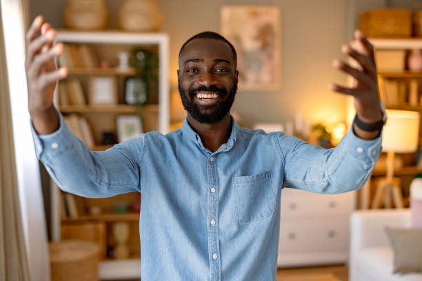 istock Happy man welcoming with open arms at home 2193017388