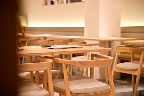 istock Cozy Dining: Natural Wood and Warm Lighting 2193023625