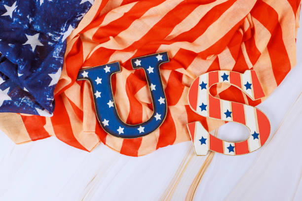 istock Colorful patriotic display featuring letters U and S on fabric with red, white, and blue patterns suitable for national celebrations 2193024663