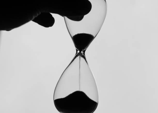istock Person holding an hourglass 2193027061