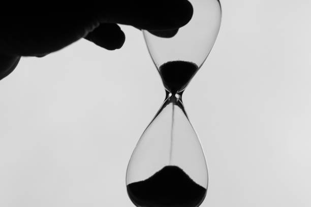 istock Person holding an hourglass 2193027079