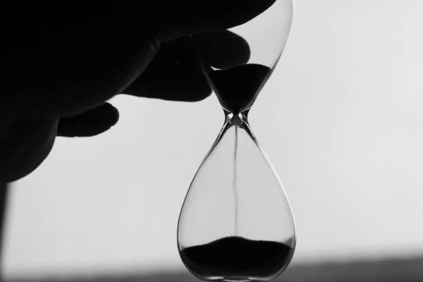 istock Person holding an hourglass 2193027094