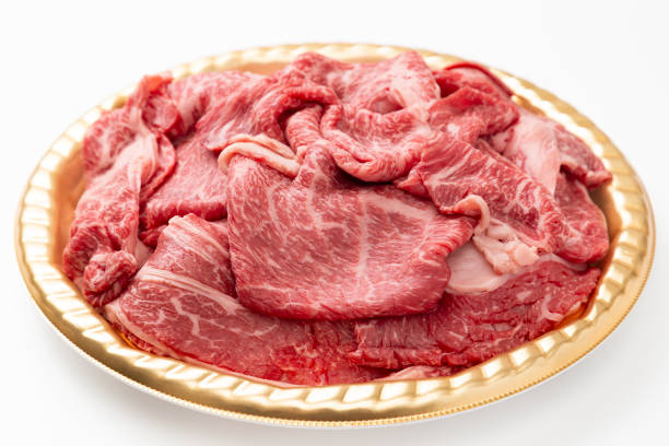 Beef shoulder loin for sukiyaki on white background.