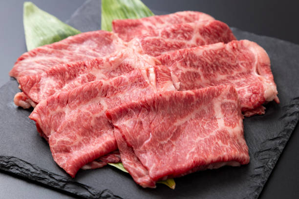 istock Beef shoulder loin for sukiyaki on a black background 2193029024
