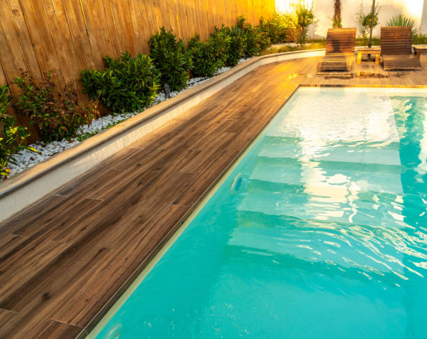 istock Swimming pool entrance steps with clean blue water at modern villa 2193033585