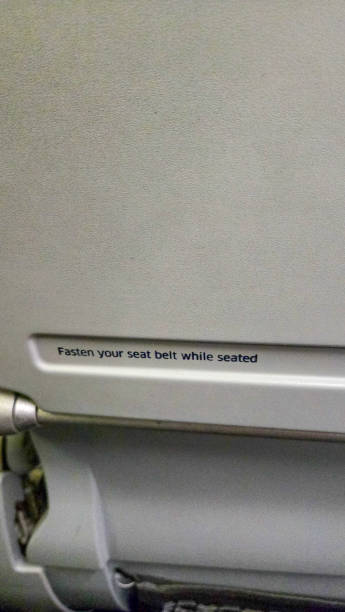 istock Fasten seat belt sign on an airplane flight 2193038775