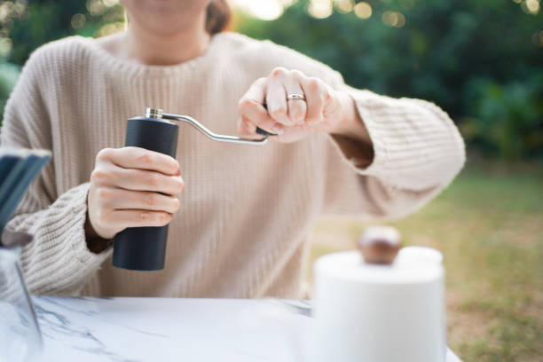 istock Asian woman making a handcraft drip coffee at the camping ground. 2193040525