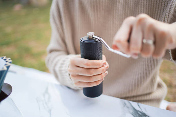 istock Asian woman making a handcraft drip coffee at the camping ground. 2193040529