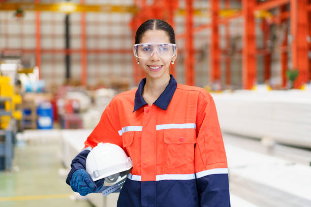istock Asian female machine engineer or technician is working - inspecting a machine systems in factory. 2193041522
