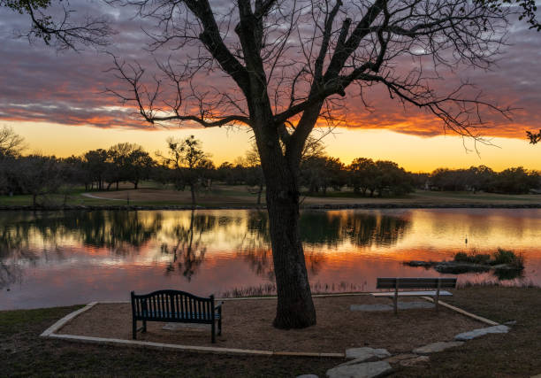 istock Dramatic sunset over Legacy Hills Park lake and golf course near Georgetown TX 2193042390