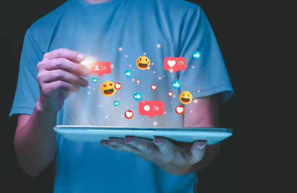istock People using tablet screen with social media and  playing with icon online social media, online marketing, technology, chat, post, like, follow 2193042721