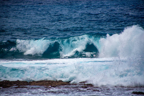 Paddling Bodyboarding in Big Waves on a warm afternoon at Makena Beach