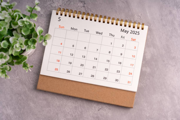 2025 May desk calendar flat lay