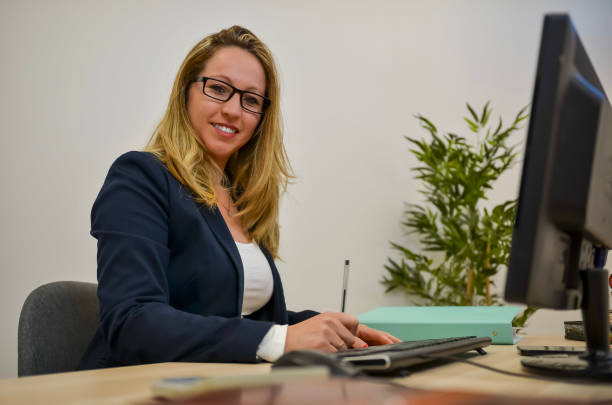 istock Young businesswoman working on computer in modern office 2193054953