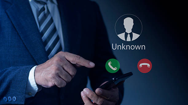 istock Businessmen using smartphone with incoming call from unknown number, Call center gang, Prank caller, scammer or stranger. 2193057474
