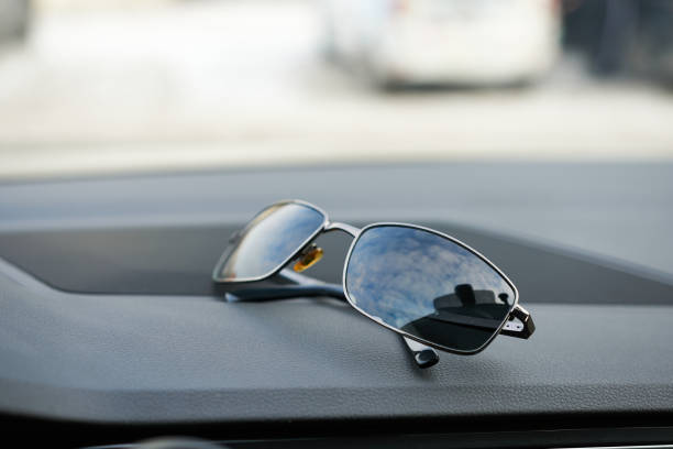 istock Sunglasses on a car. Selective focus. Shallow depth of field. 2193059693