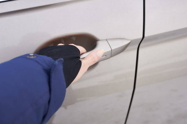 istock Close-up of a hand opening a car door, focus on the hand. Keyless access. 2193059708
