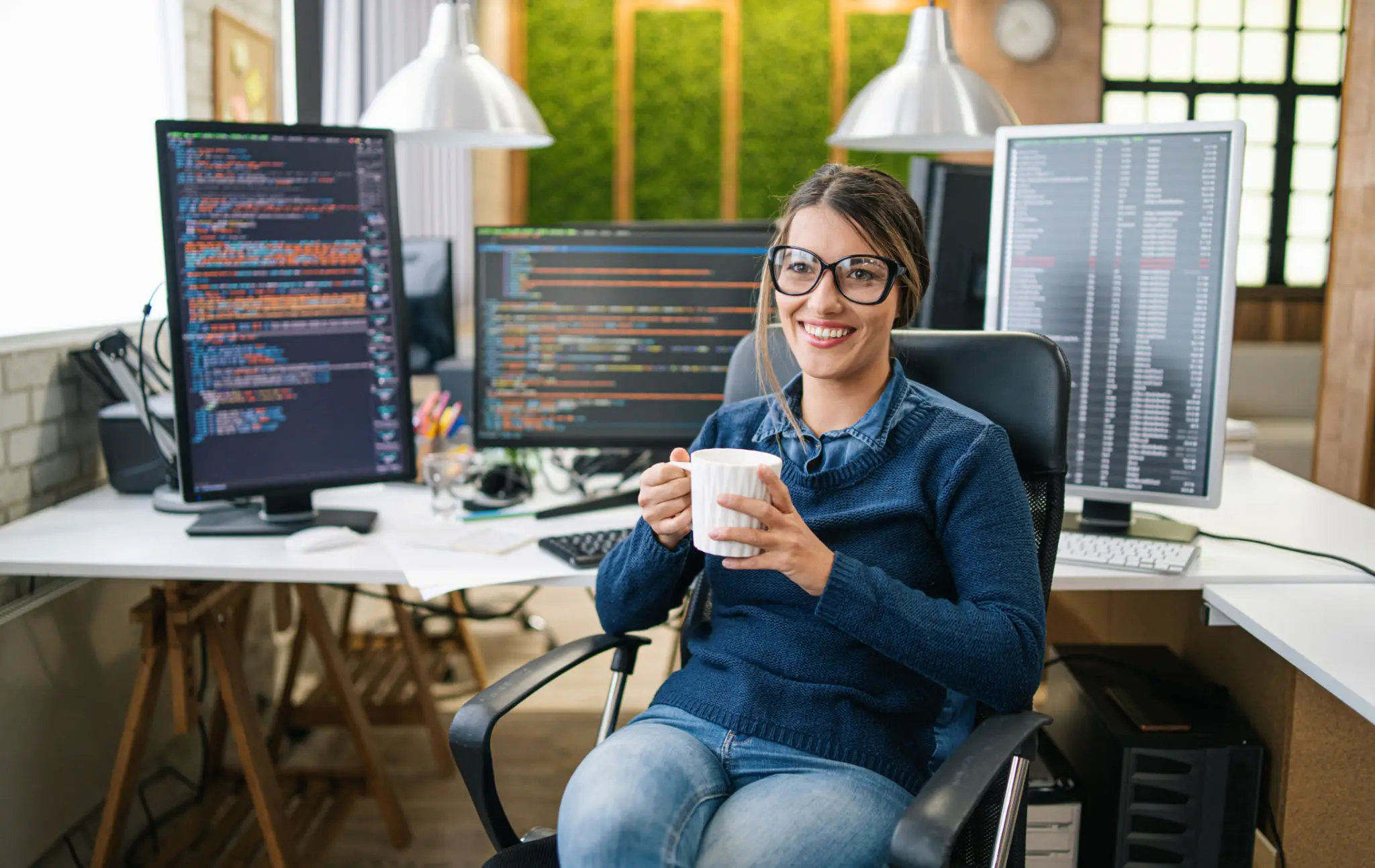 컴퓨터와 파이썬: 함수의 신비한 세계 2 Female freelance developer coding and programming. Coding on two with screens with code language and application