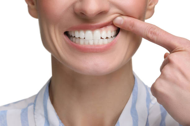 istock Woman showing her clean teeth on white background, closeup 2193064974