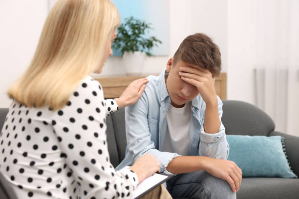 istock Psychologist working with teenage boy in office 2193066691