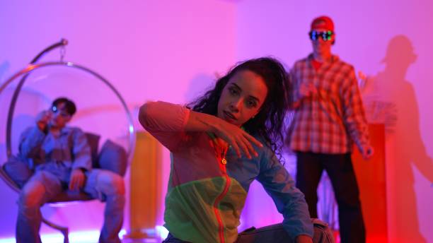 istock Happy dancer looking at camera while smart woman moving at rhyme. Regalement. 2193067279