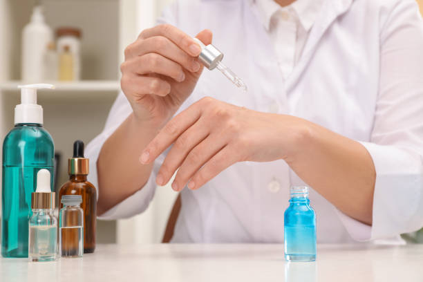 istock Dermatologist testing cosmetic product at white table indoors, closeup 2193067928
