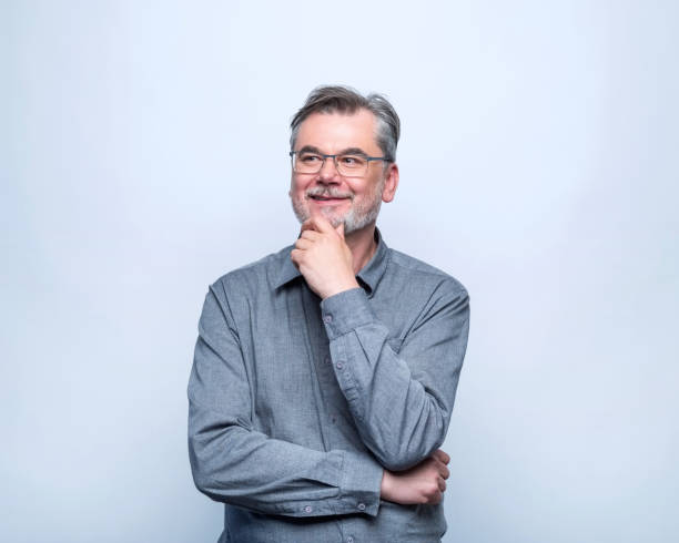 istock Portrait of smiling mature man 2193068572