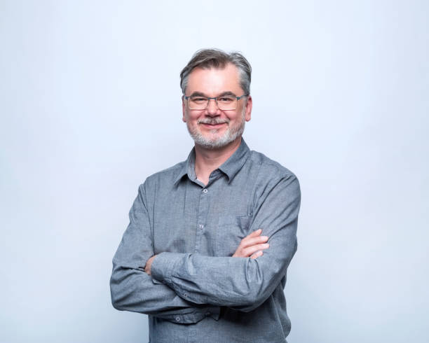 istock Portrait of smiling mature man 2193068580