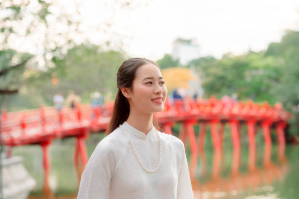 istock Vietnamese woman and landmark 2193072600