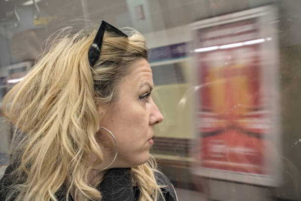 istock Blonde woman commuting 2193073834