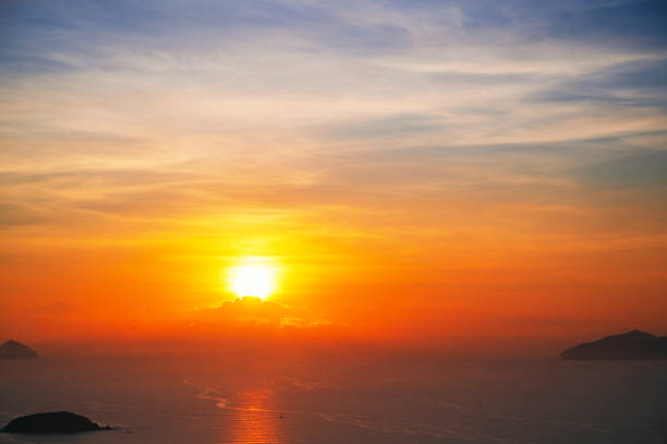 sunrise or sunset over the sea.