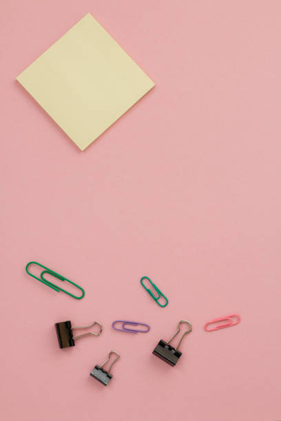 istock colorful office stationery on pink background 2193077721