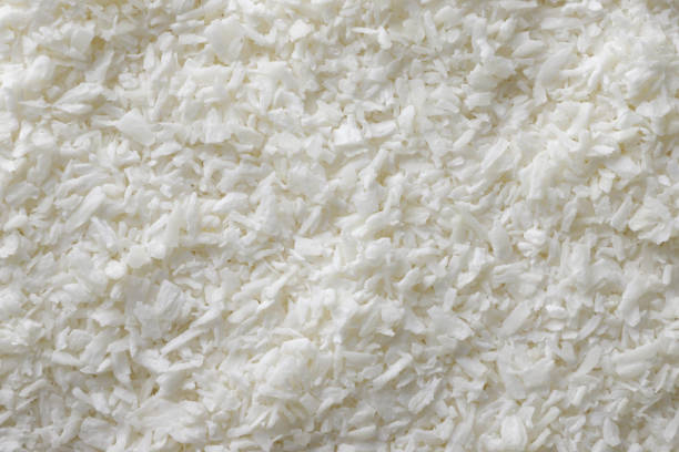 istock Fresh coconut flakes background. Top view 2193077743