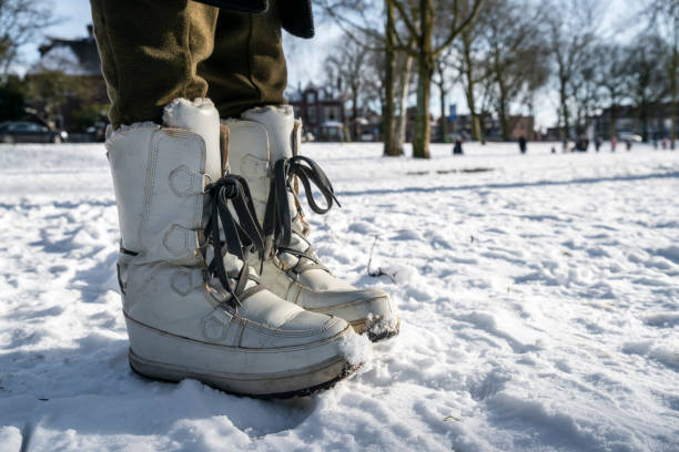 istock Snow boots in a snow-covered park 2193081341