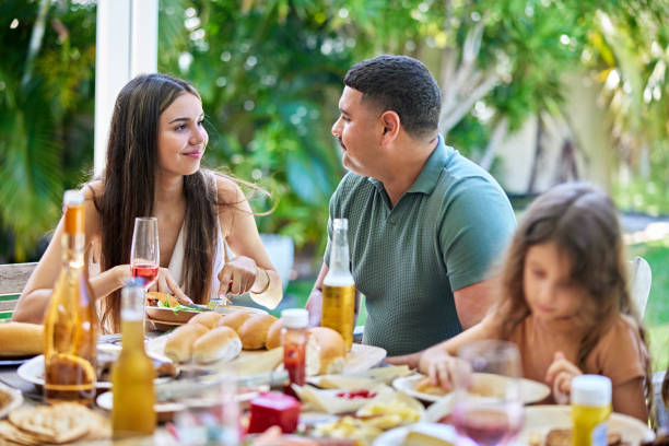 istock Young couple enjoying lunch together 2193081835