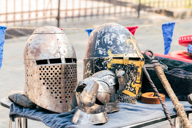 istock medieval iron helmet and sword reenactment props 2193081964