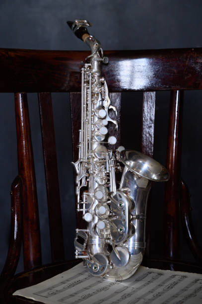 istock A silver saxophone on an old chair 2193082462