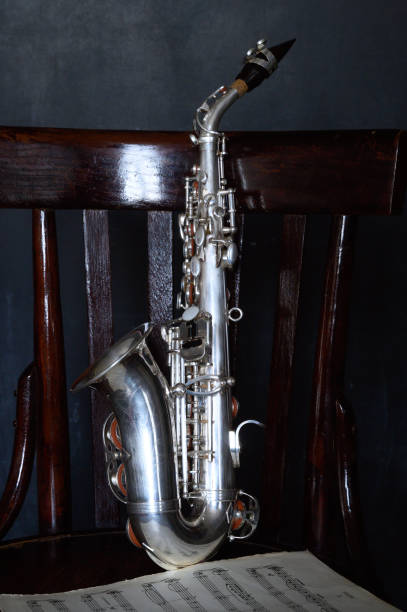 istock A silver saxophone on an old chair 2193082571