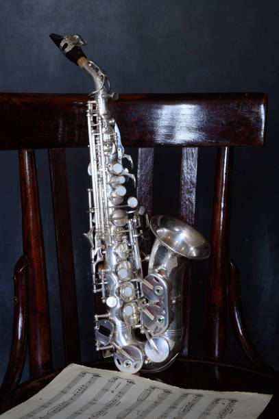 istock A silver saxophone on an old chair 2193082845