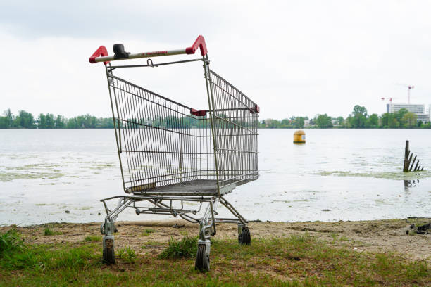 istock A supermarket trolley abandoned by a lake 2193082927