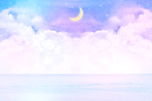 istock crescent moon and the clouds, surface of the sea in the night sky background illustration 2193083025
