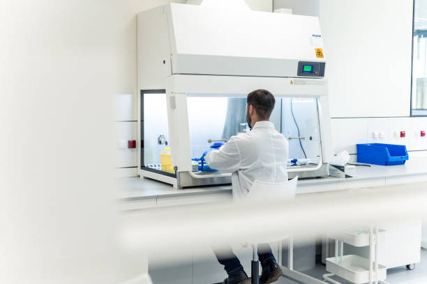 istock Scientist working with a laminar flow cabinet in a laboratory 2193088325